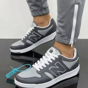 Premium retro court low-top sneakers with layered upper panels, statement side detailing and cushioned sole