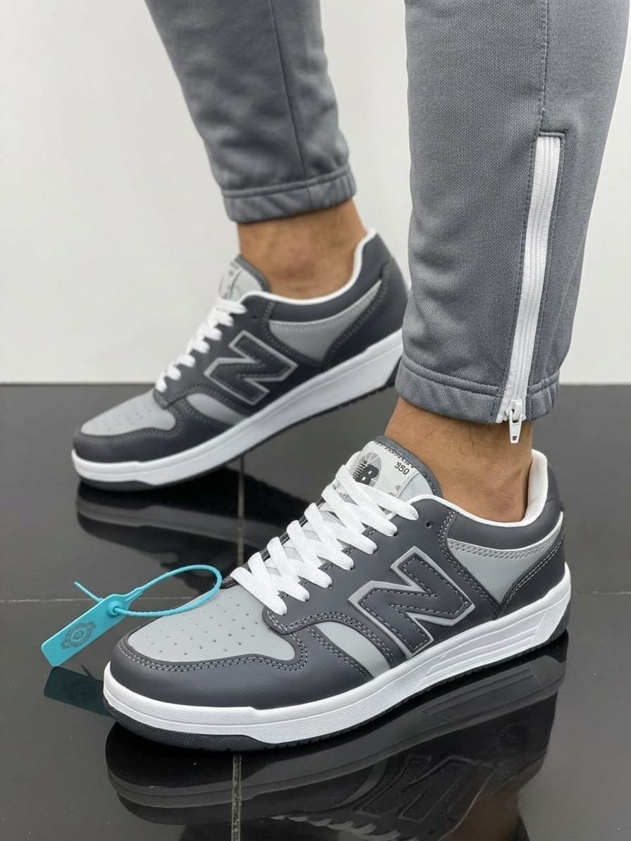 Premium retro court low-top sneakers with layered upper panels, statement side detailing and cushioned sole