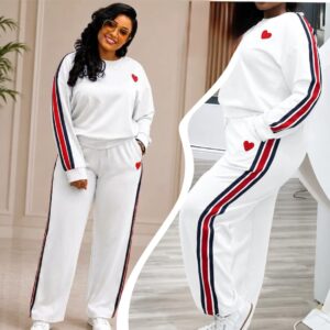 Women’s two-piece side-stripe lounge tracksuit with long-sleeve top and matching wide-leg pants