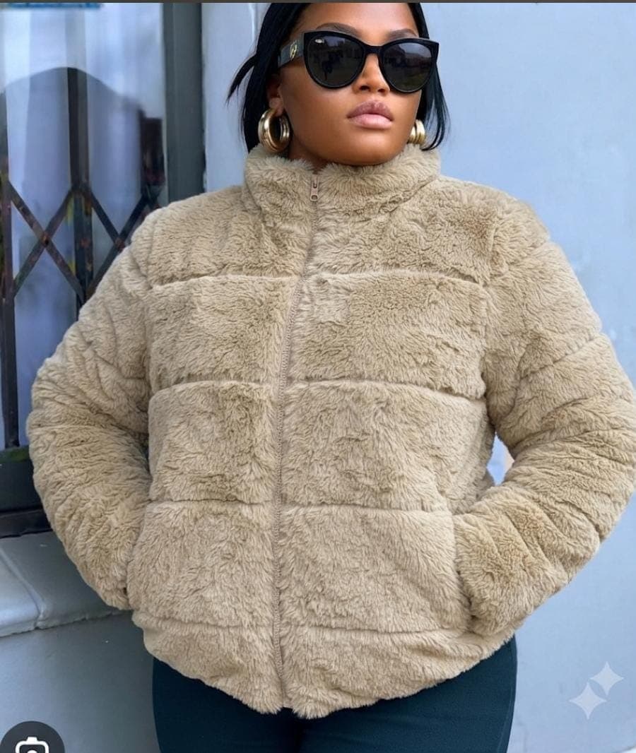 Women’s premium teddy fleece pullover with plush textured finish, high neckline and functional front pocket