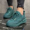 Unisex chunky lace-up lifestyle sneakers featuring layered upper detailing, padded collar, cushioned sole, and textured outsole.